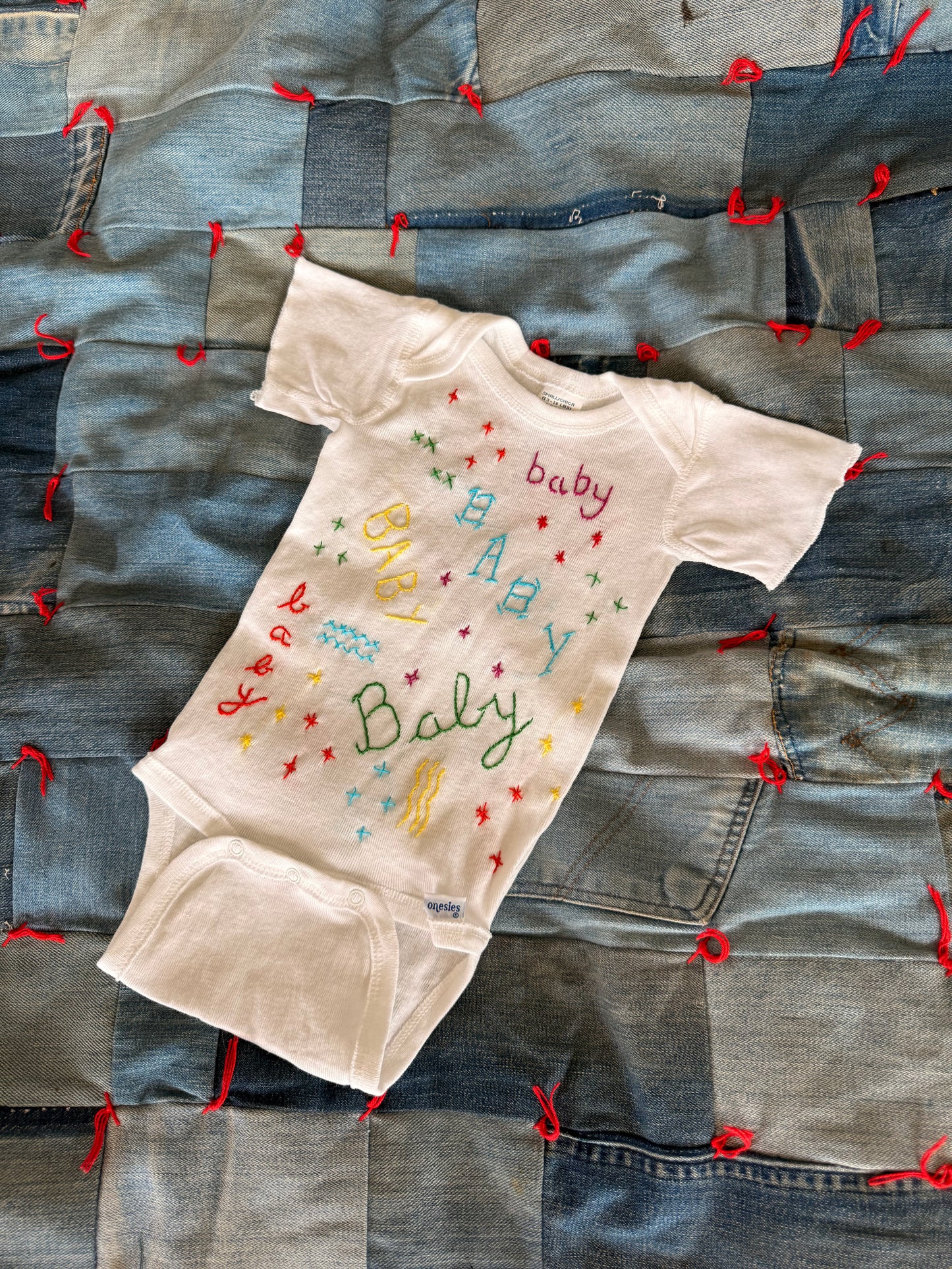 MADE BY KID GLOVES : hand embroidered baby baby baby onesie