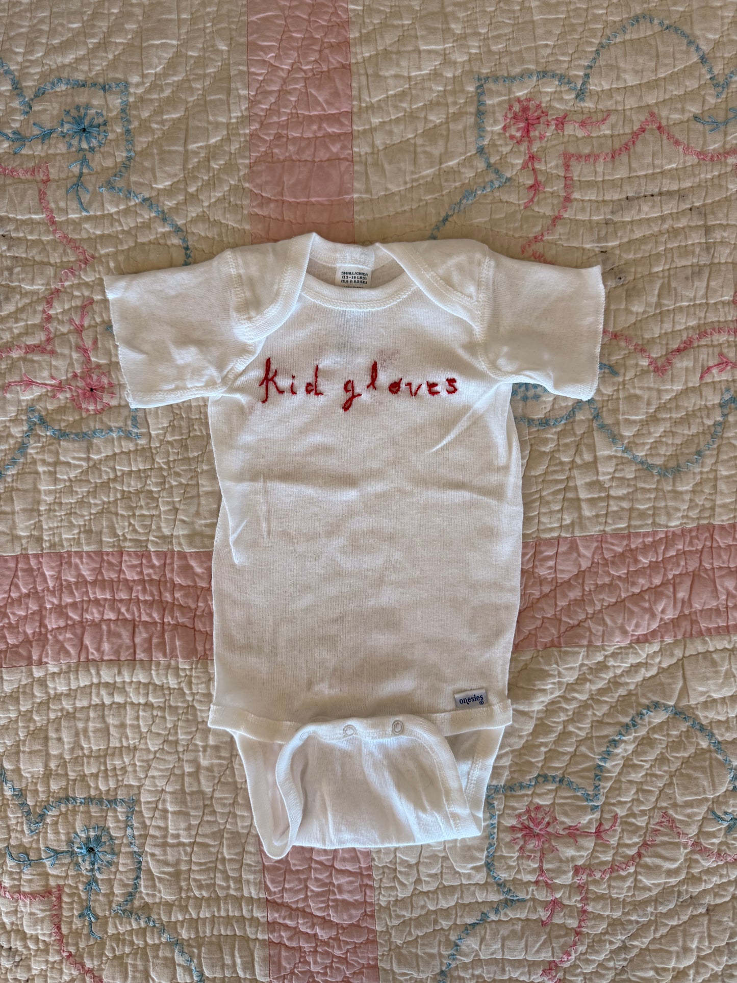 MADE BY KID GLOVES : hand embroidered logo onesie
