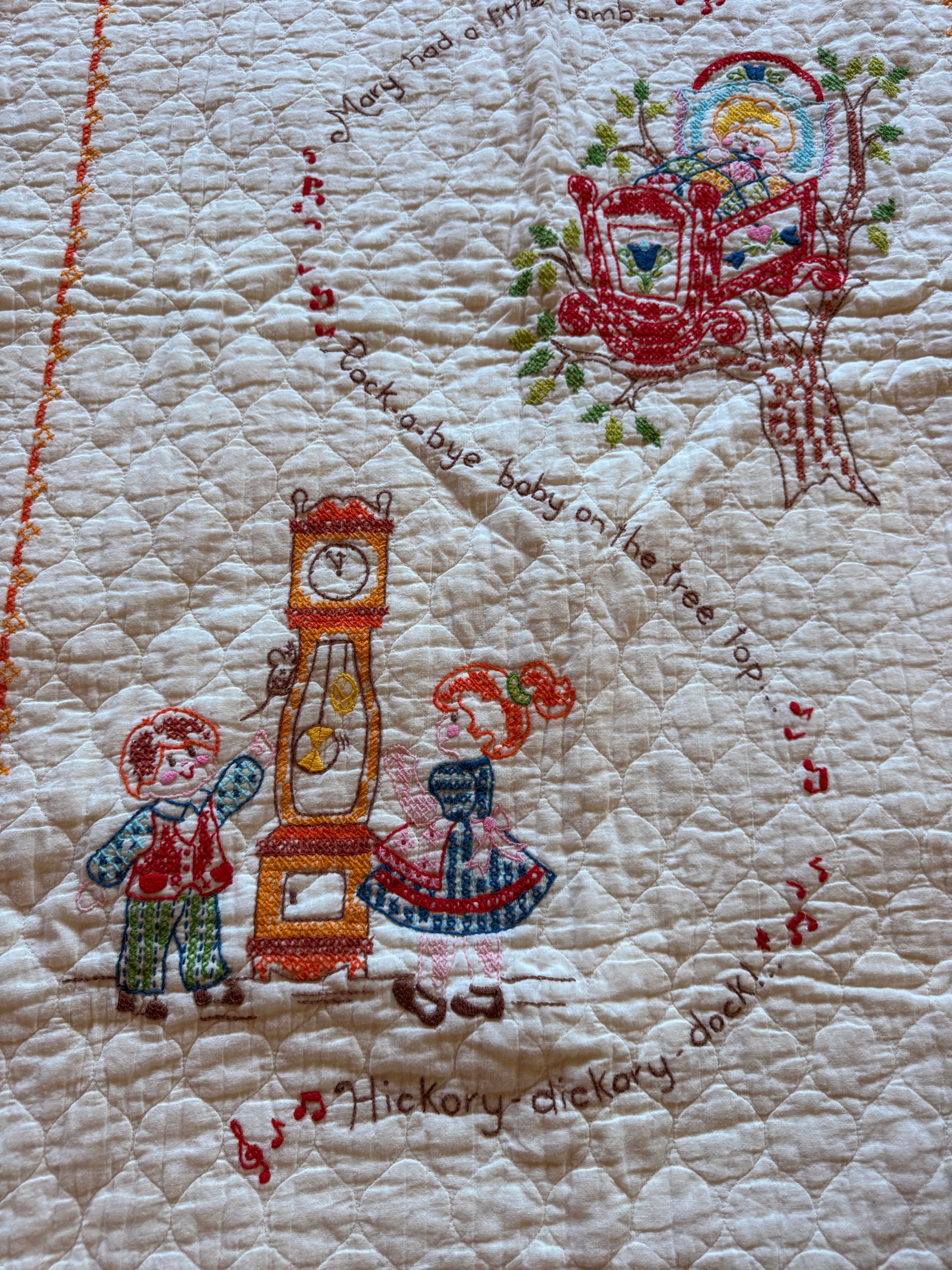 1970s nursery rhyme cross stitch crib quilt