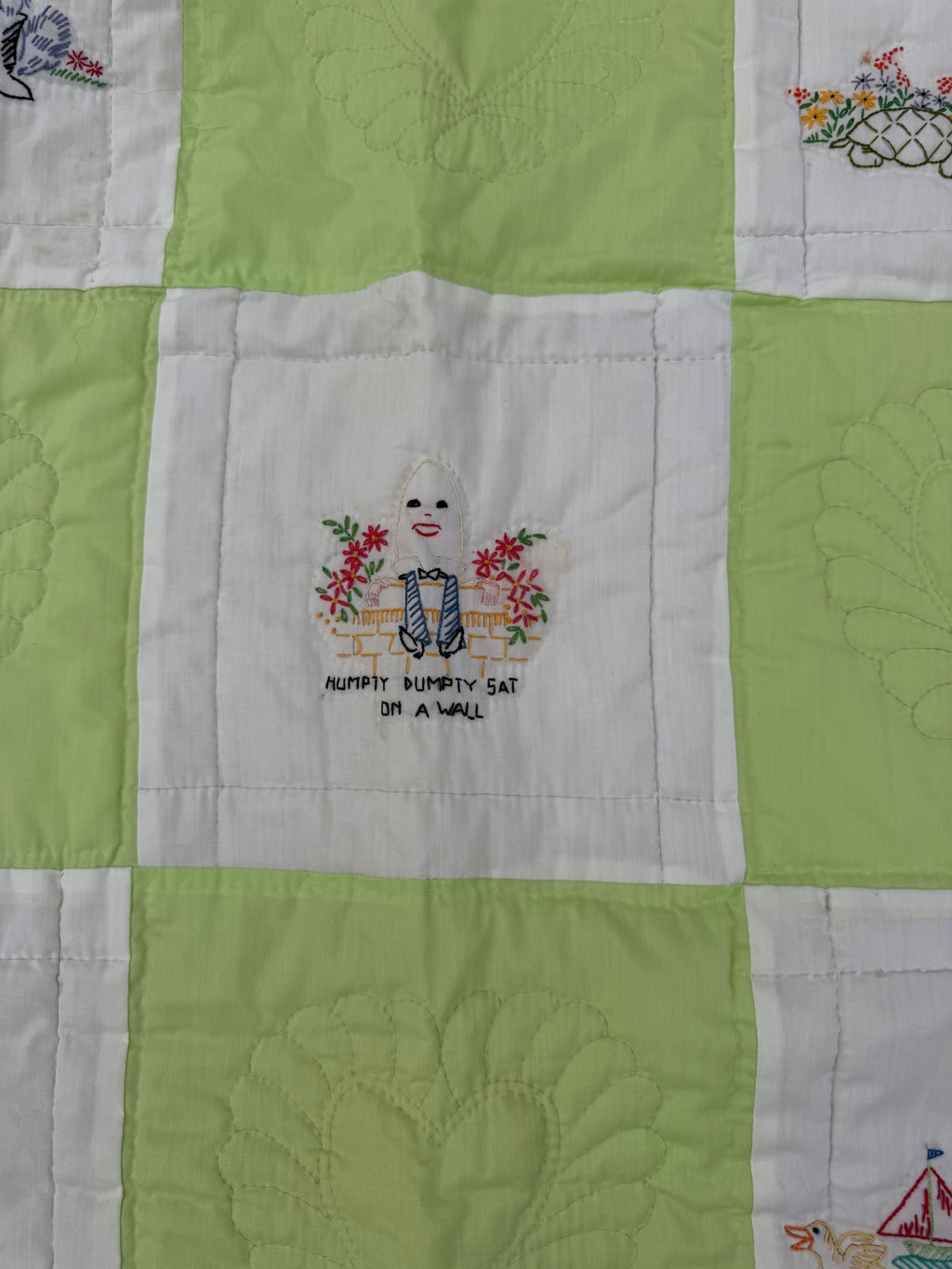1970s embroidered nursery rhyme crib quilt