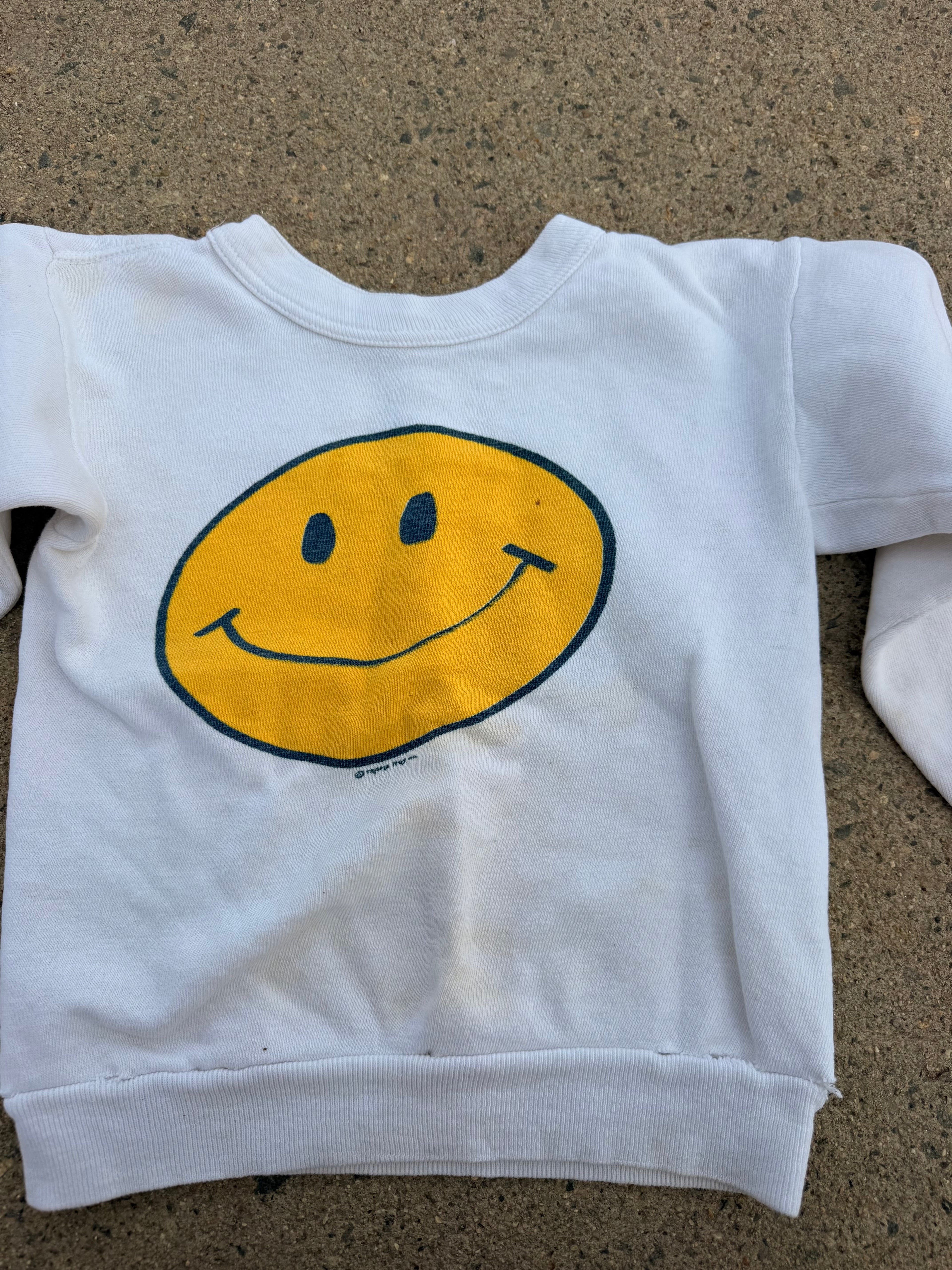 1970s smiley face sweatshirt