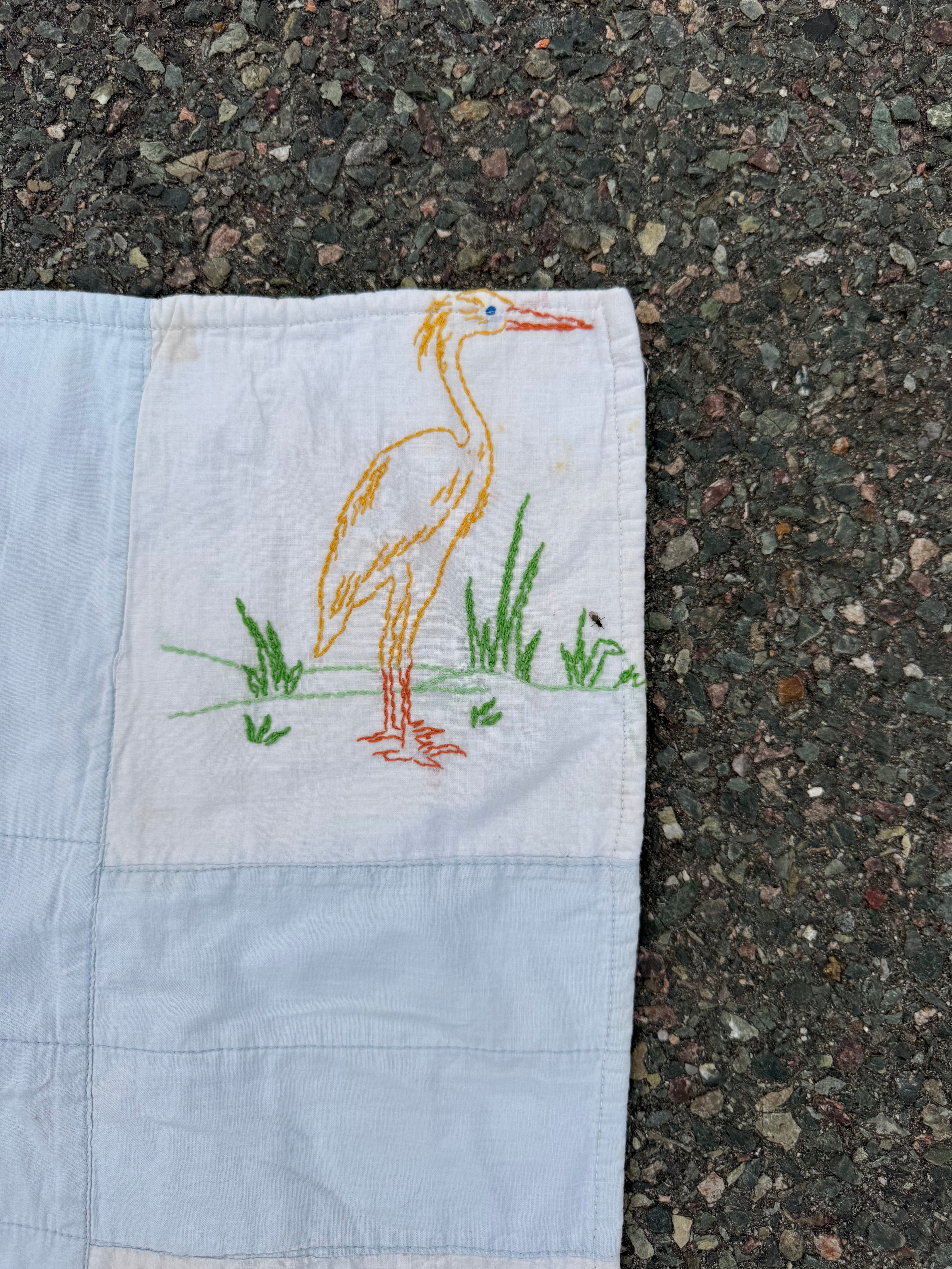 1940s embroidered story book crib quilt