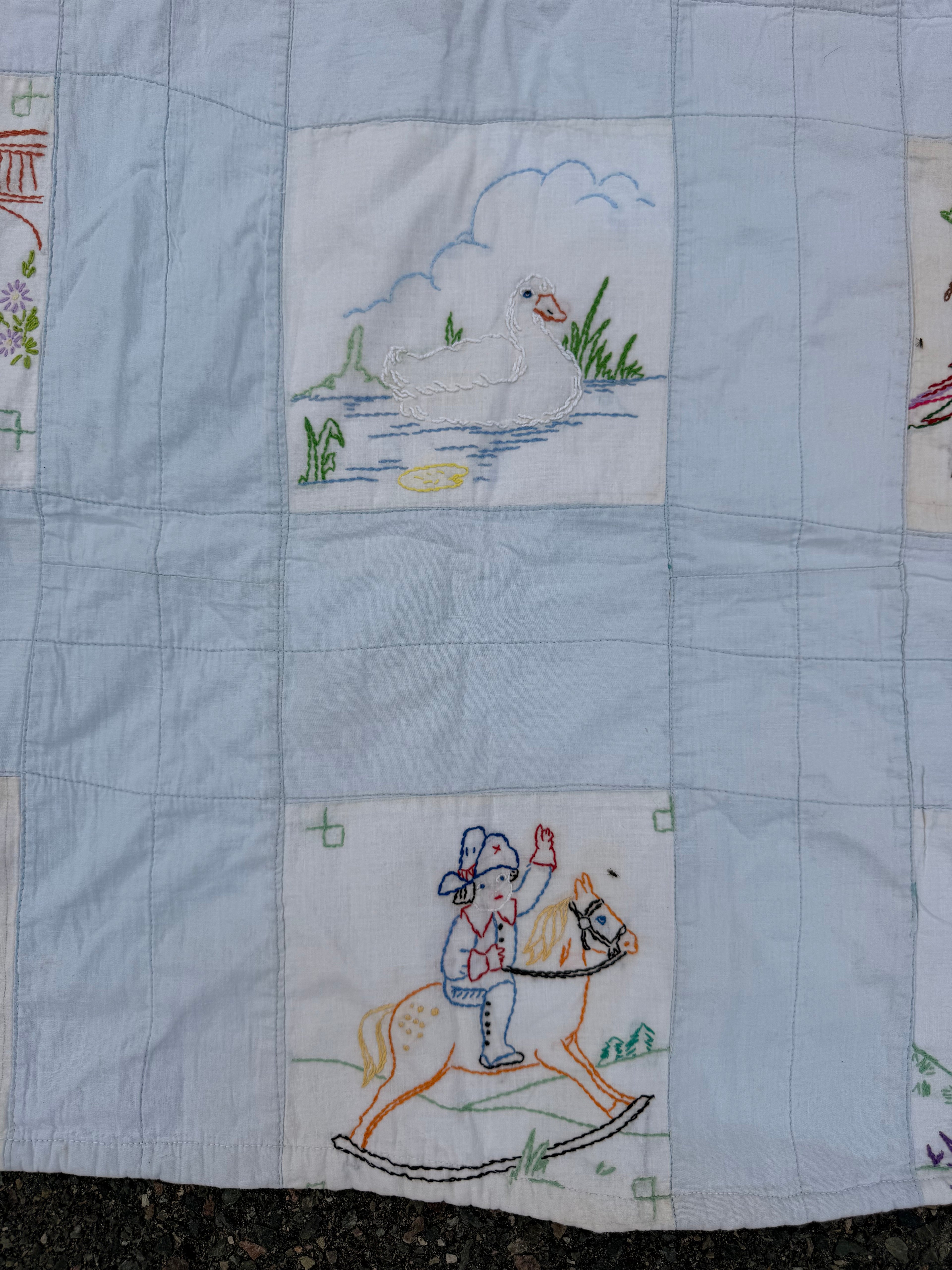 1940s embroidered story book crib quilt