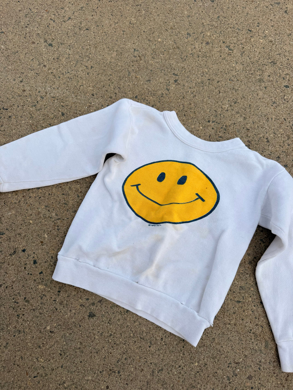 1970s smiley face sweatshirt