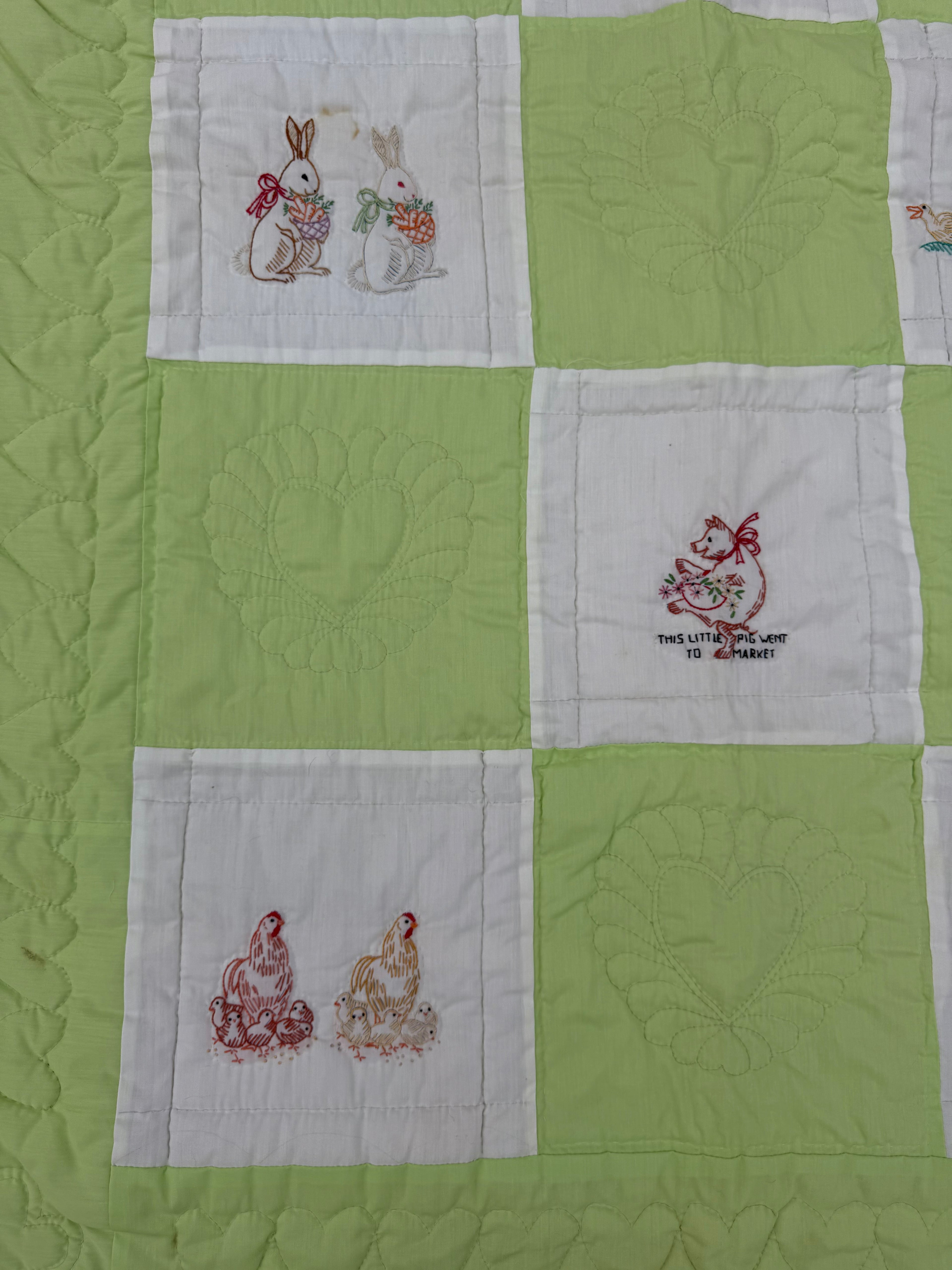 1970s embroidered nursery rhyme crib quilt