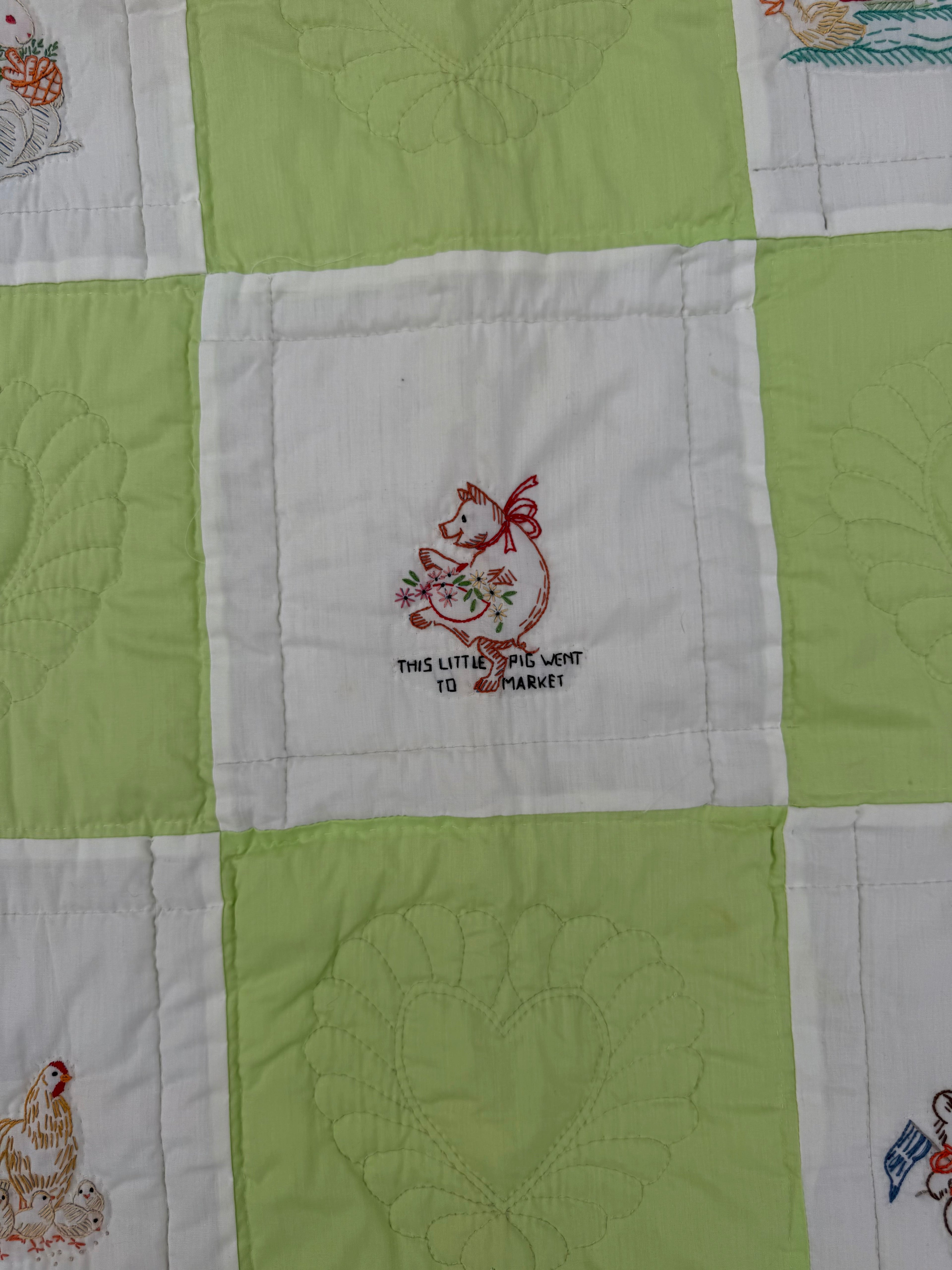 1970s embroidered nursery rhyme crib quilt