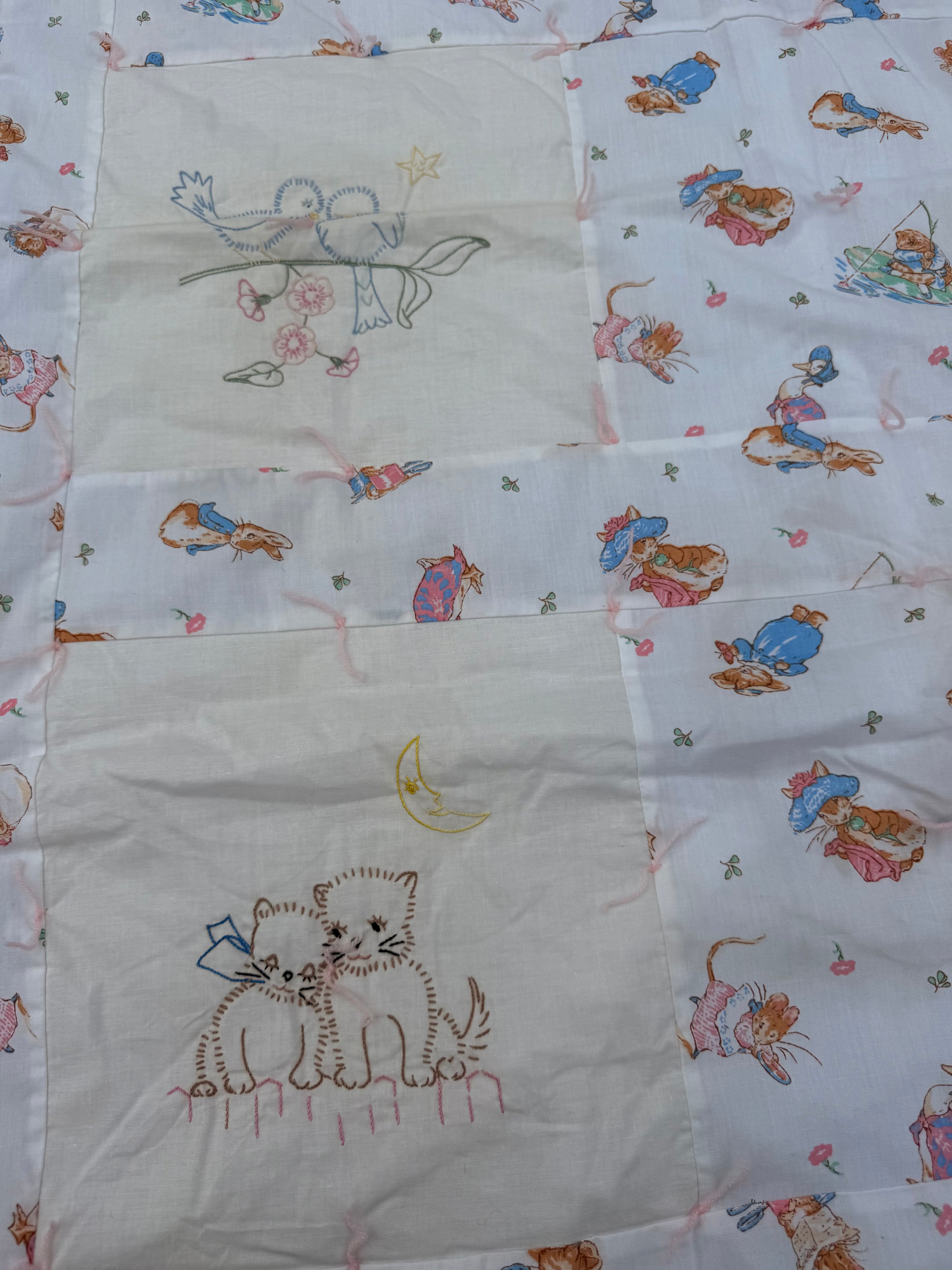 1980s embroidered beatrix potter crib quilt