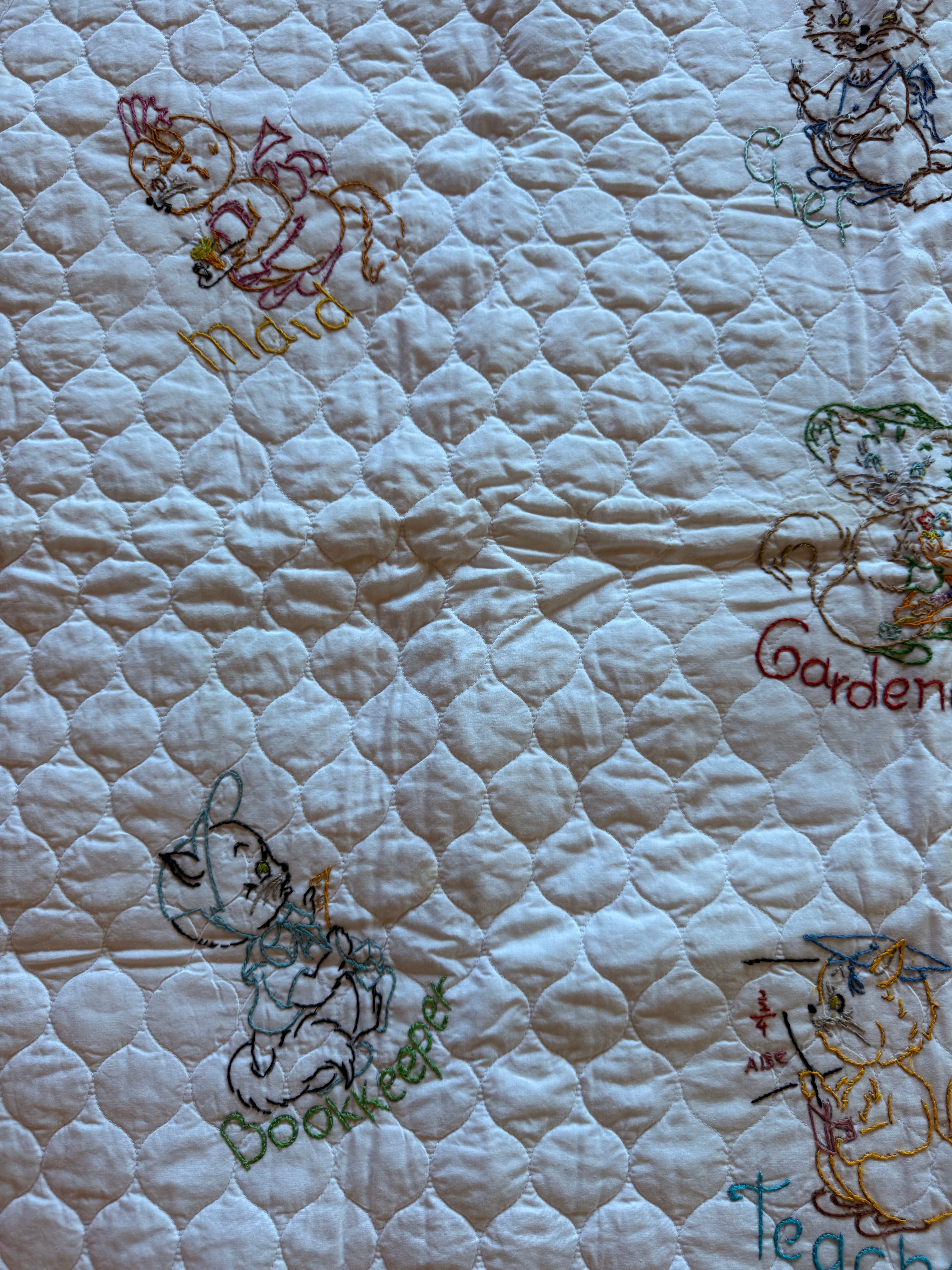 1970s embroidered worker mouse crib quilt