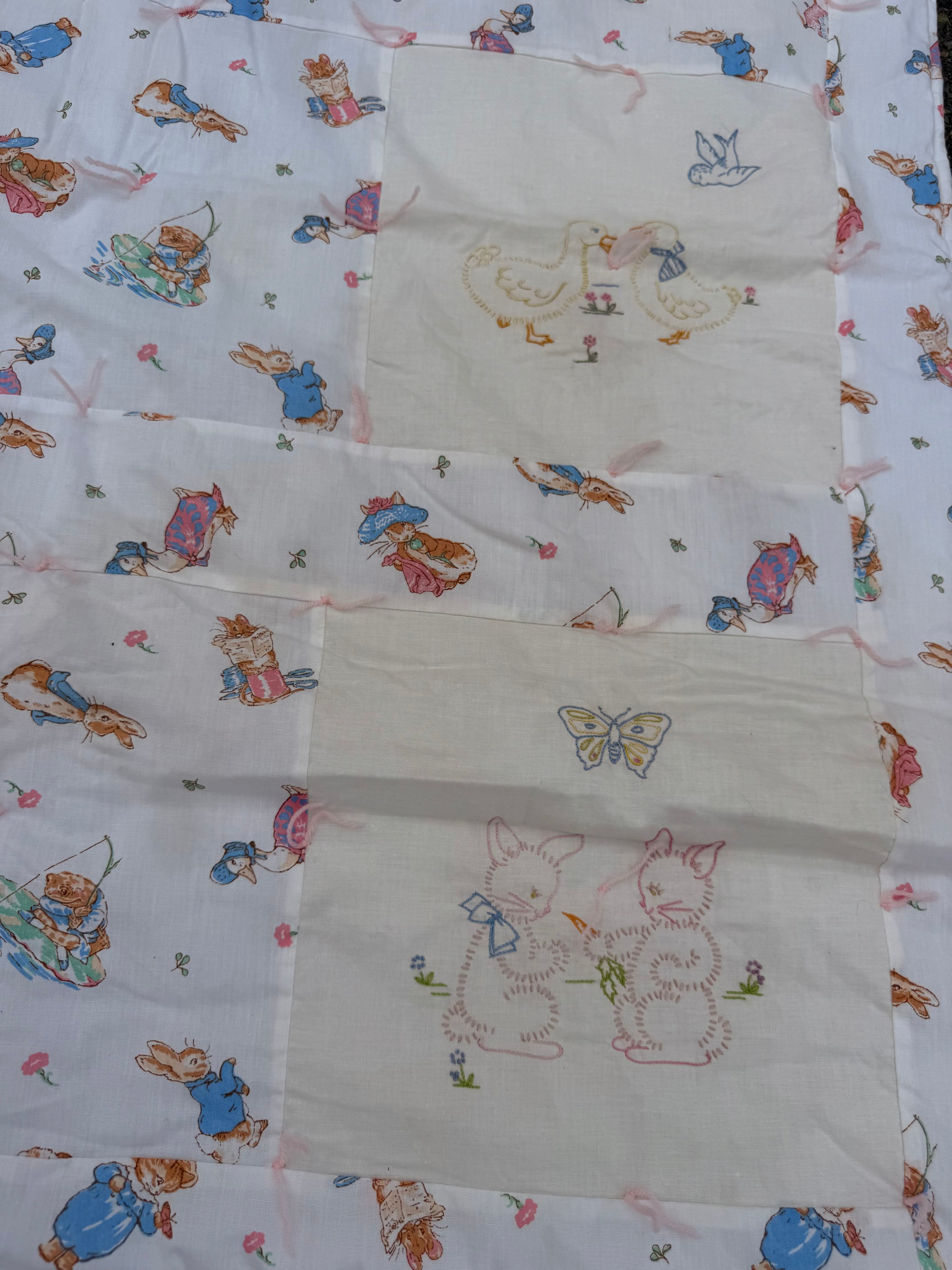 1980s embroidered beatrix potter crib quilt