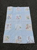 1940s embroidered story book crib quilt