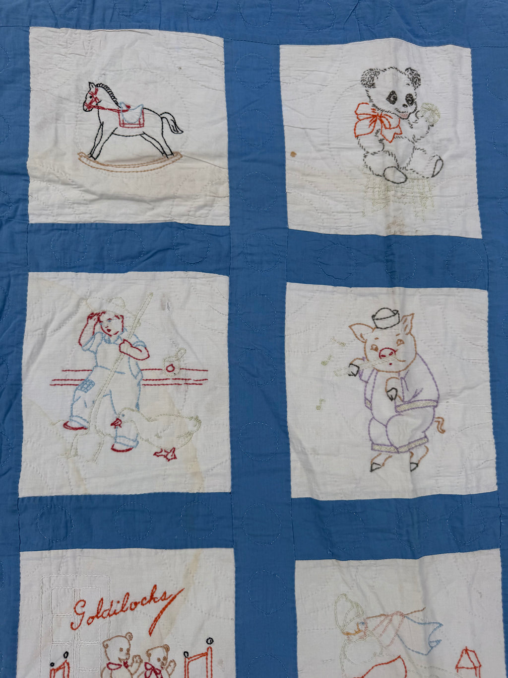 1940s embroidered nursery rhyme crib quilt