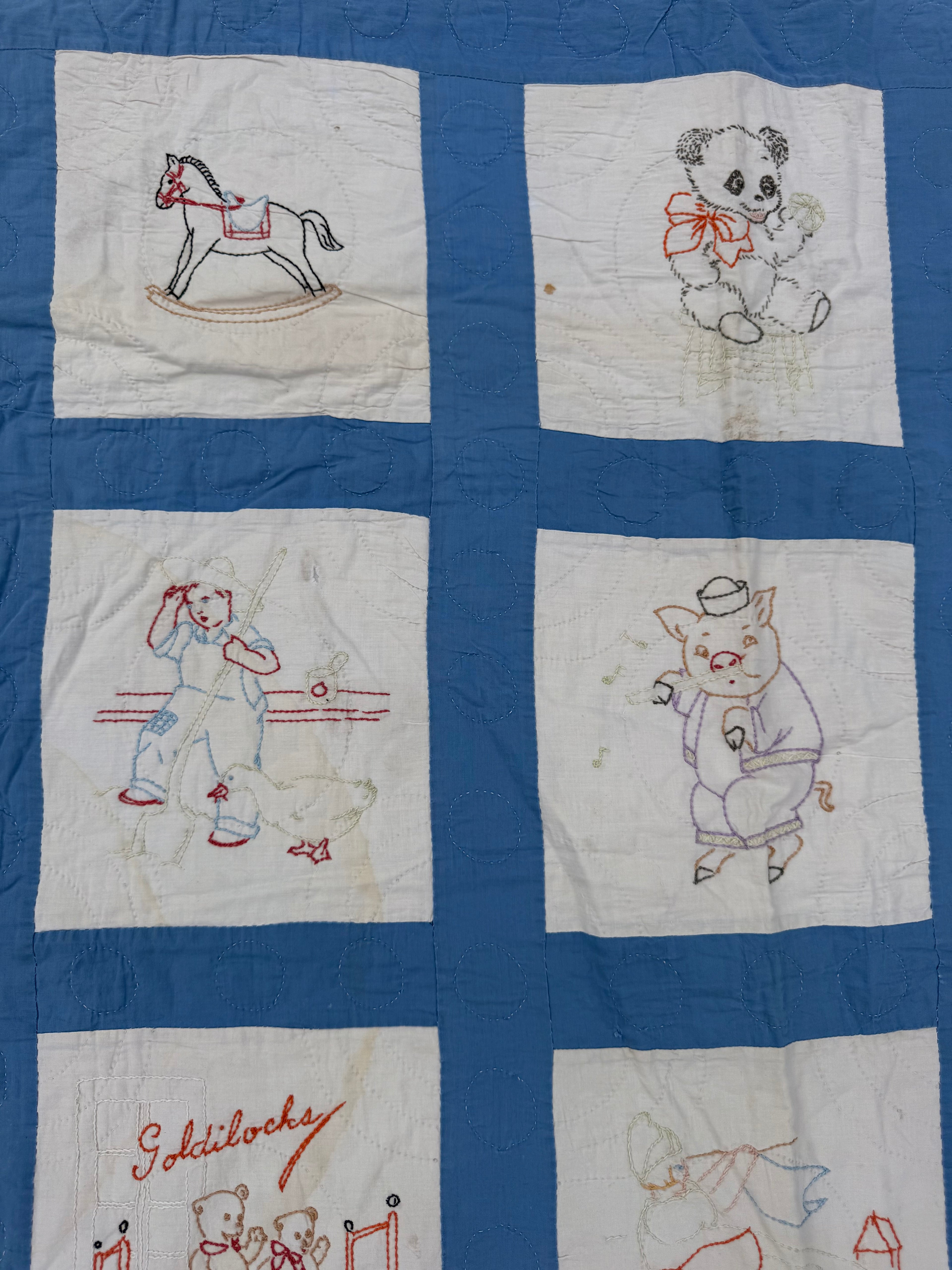 1940s embroidered nursery rhyme crib quilt