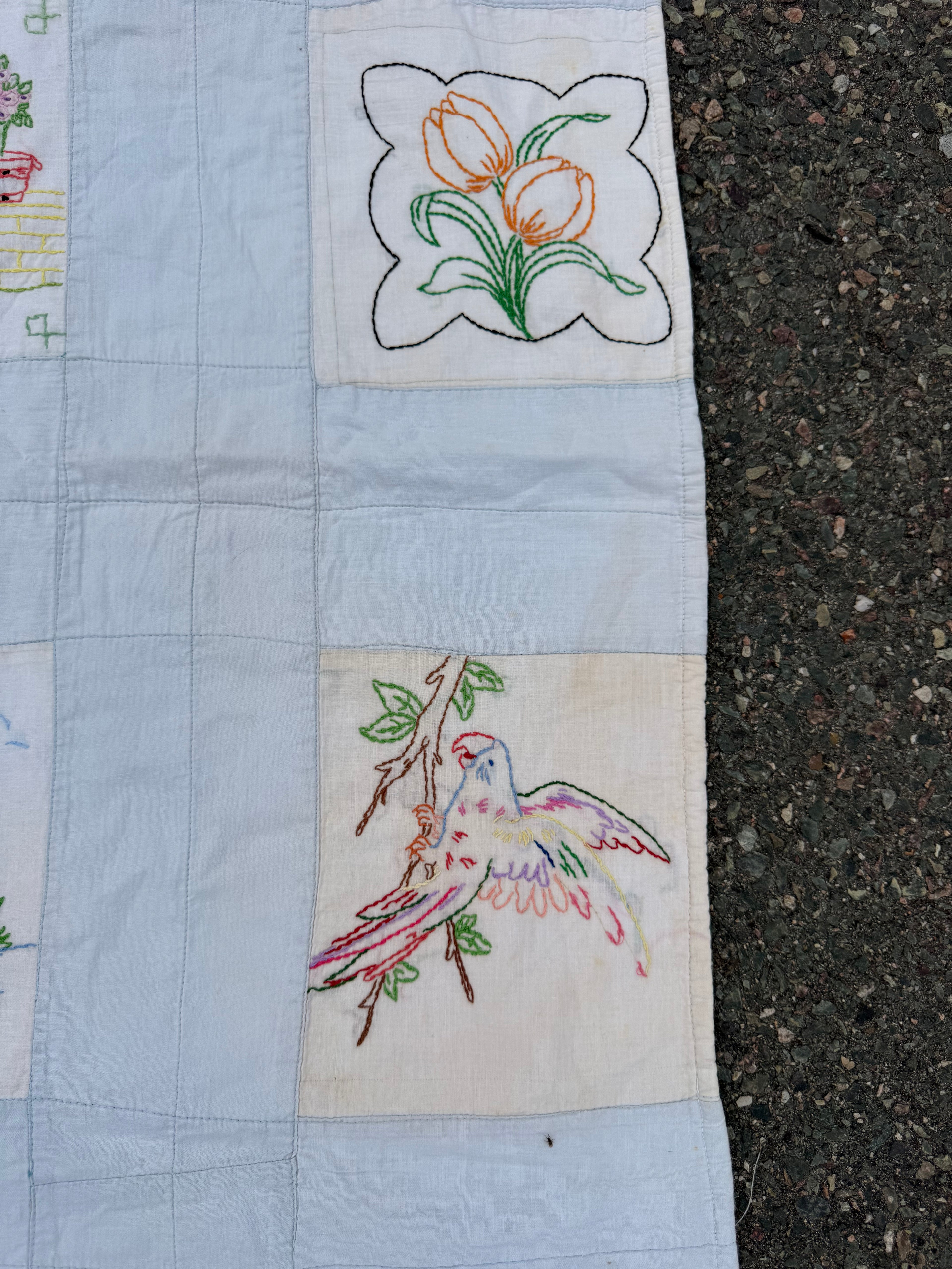 1940s embroidered story book crib quilt