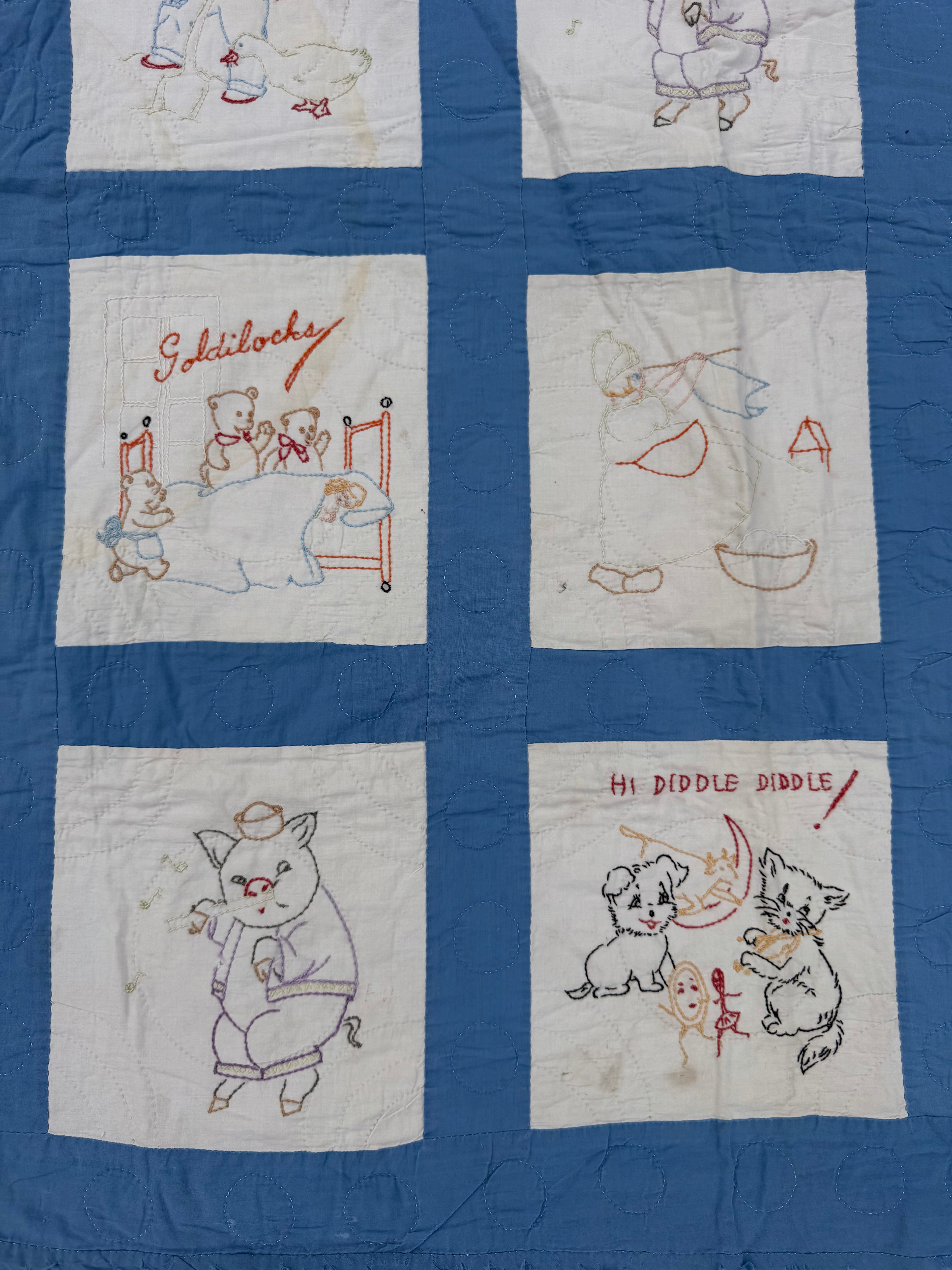 1940s embroidered nursery rhyme crib quilt