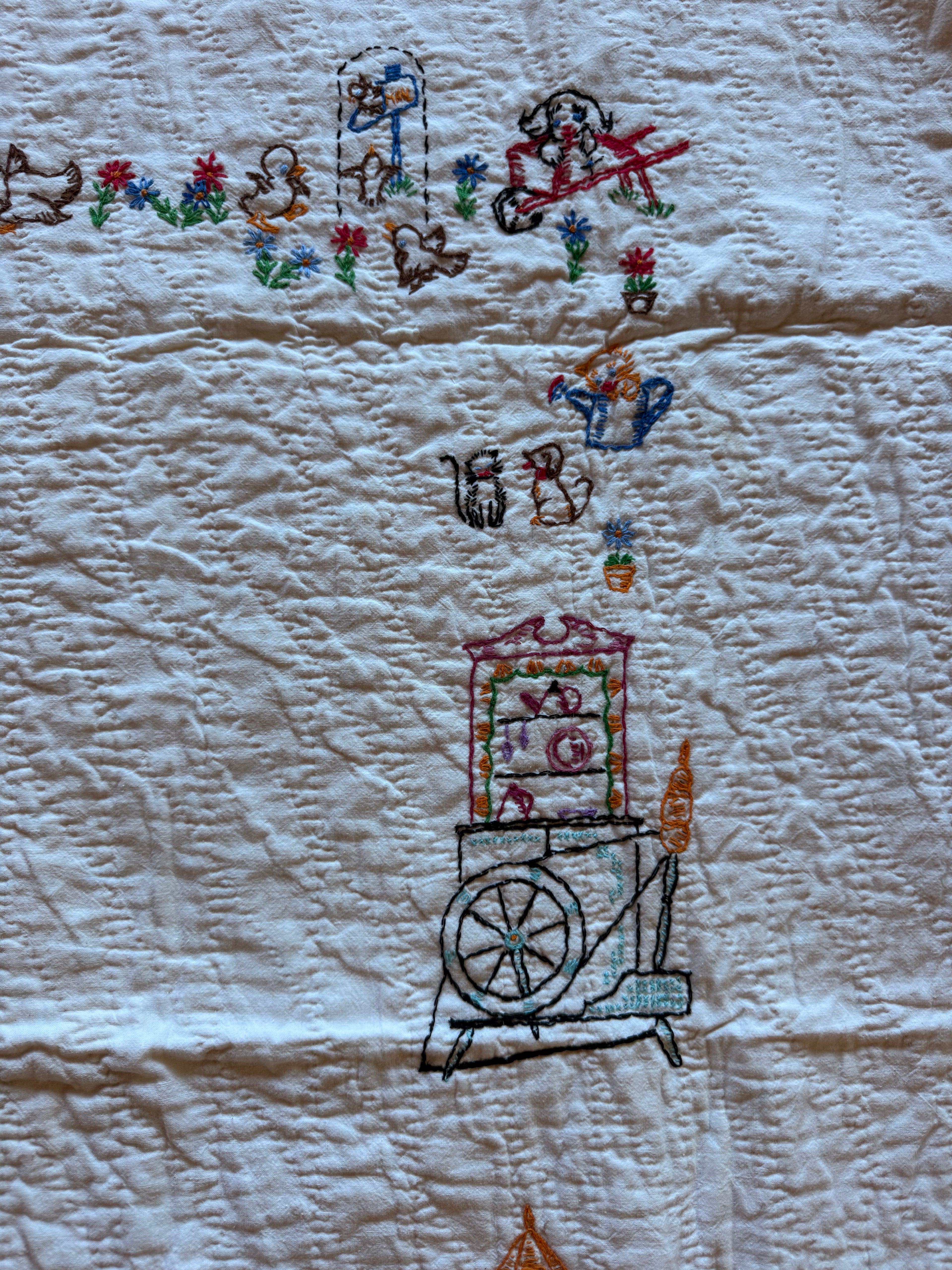 1950s embroidered garden crib quilt