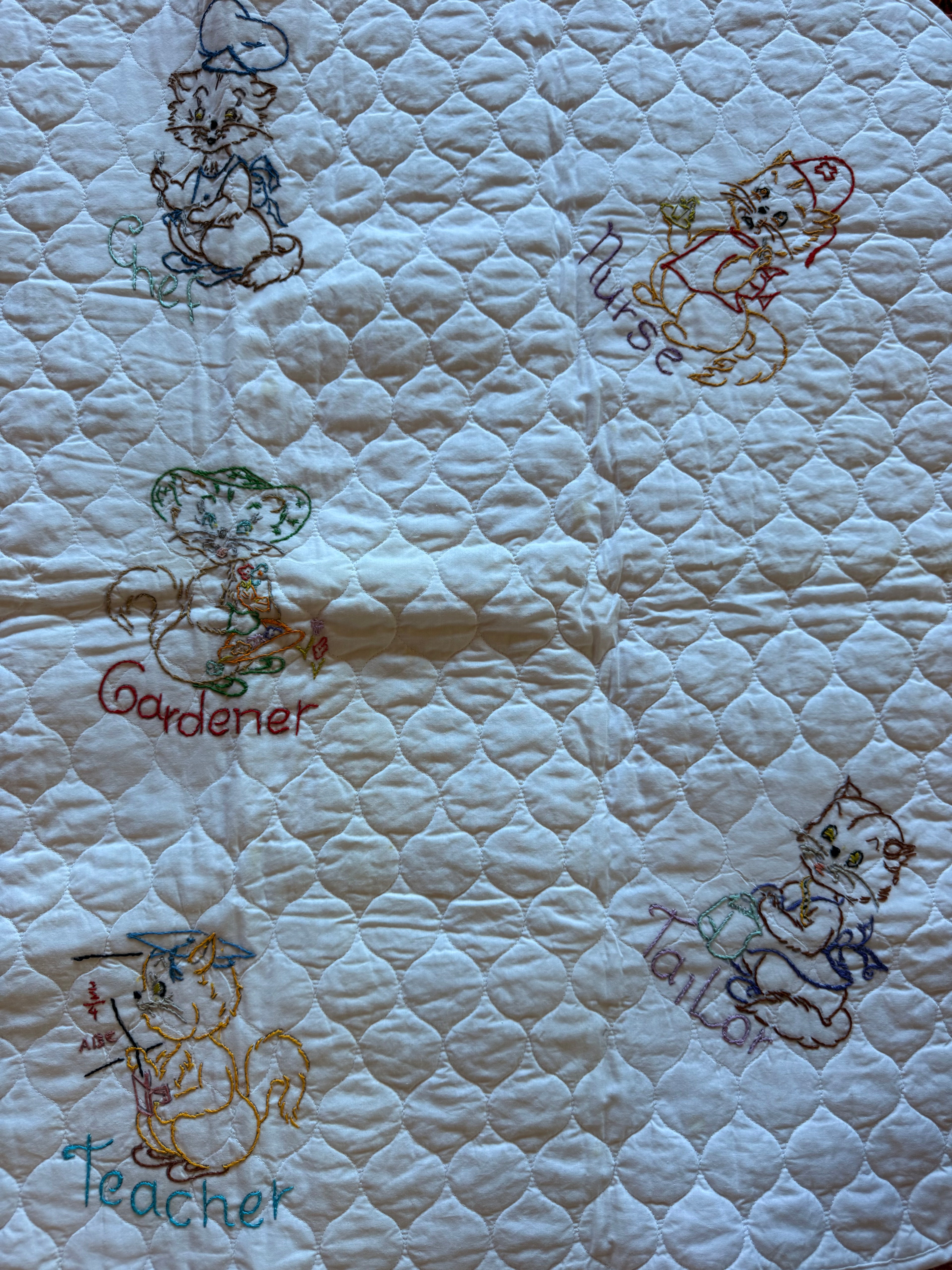1970s embroidered worker mouse crib quilt