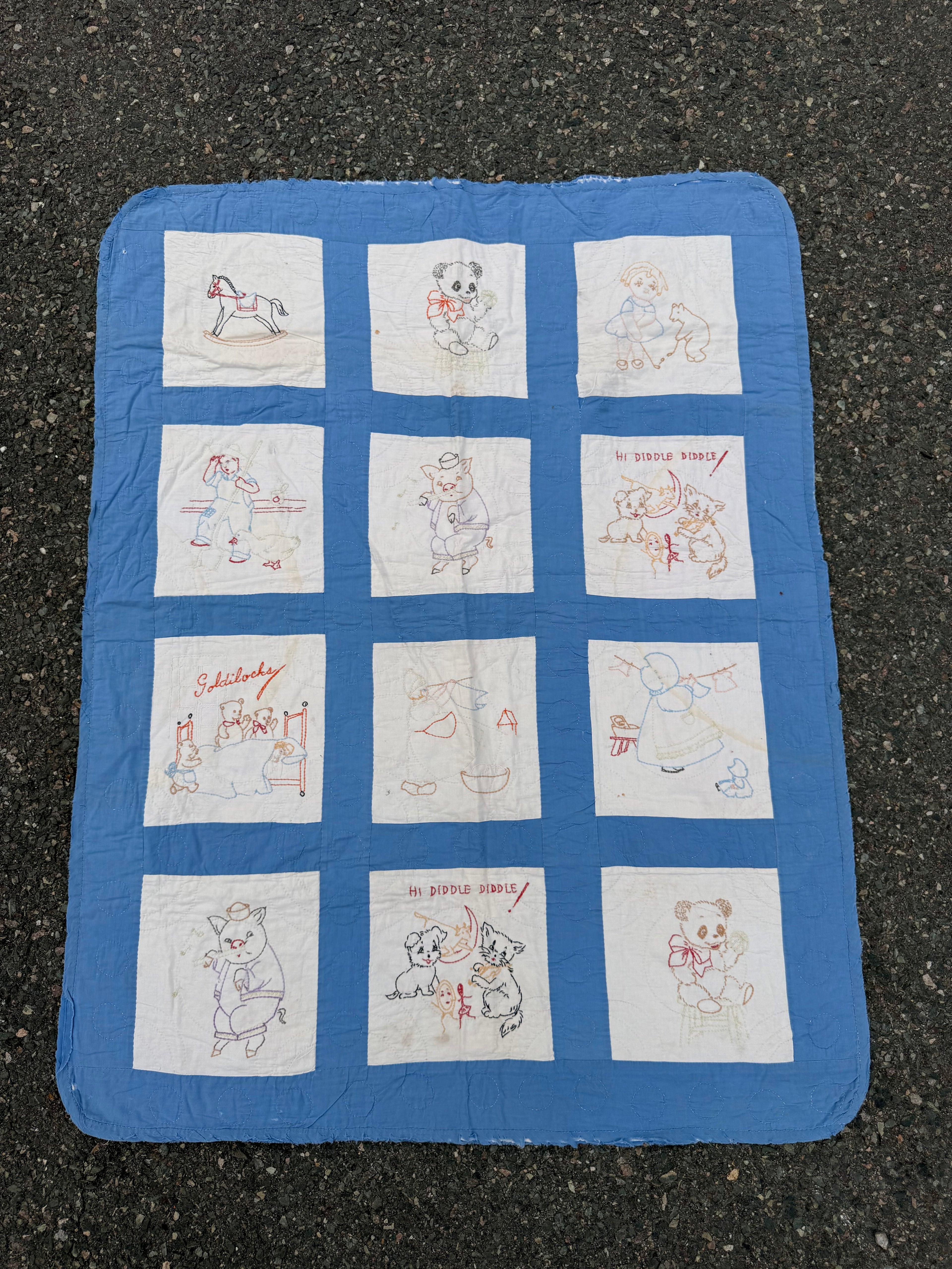 1940s embroidered nursery rhyme crib quilt