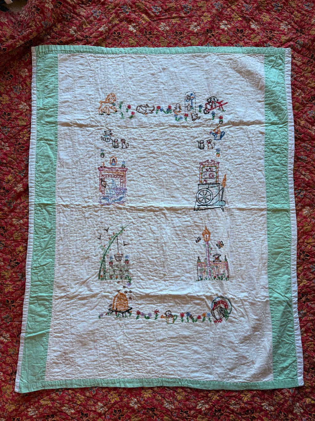 1950s embroidered garden crib quilt