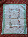 1950s embroidered garden crib quilt