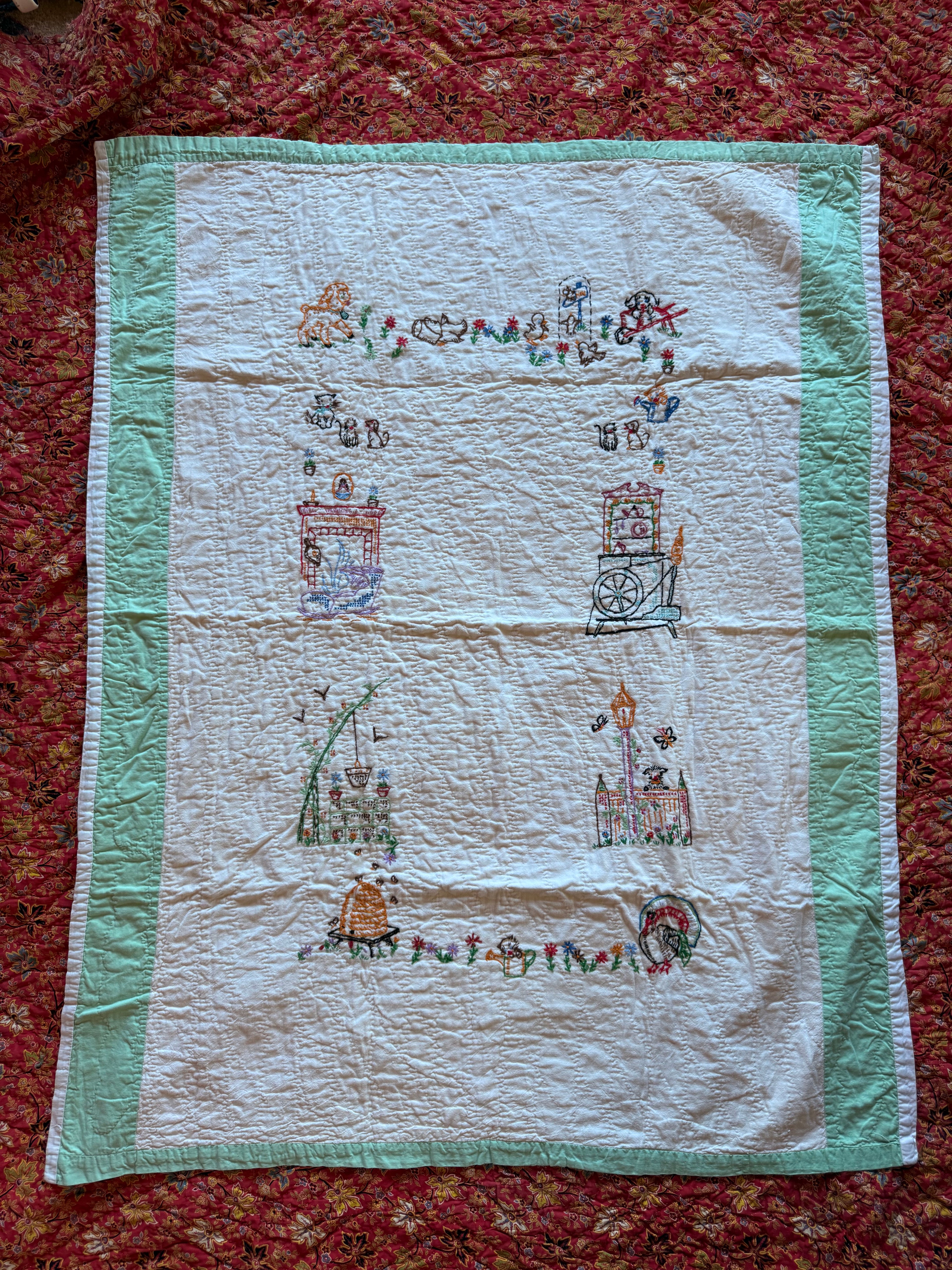 1950s embroidered garden crib quilt